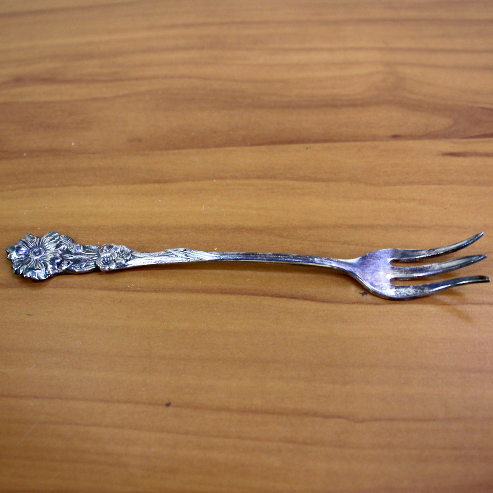 Vintage Reed and Barton Harlequin Bachelor Button Olive Fork: Silverplate. 5.5 inches long. 15.9g.