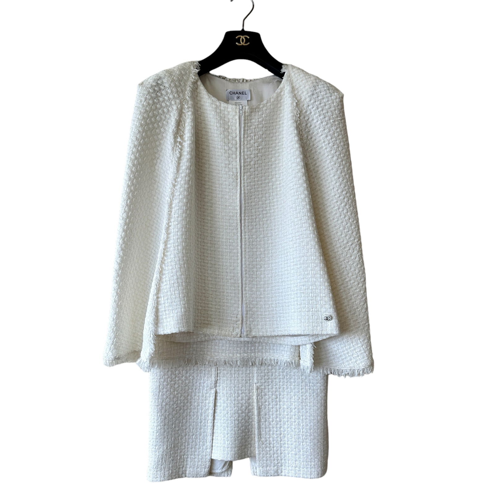 Chanel Tweed Cape Jacket 40 and Skirt Suit Set 38: Rare iconic cape SET in ribbon tweed design with enamel buttons. Cape is size 40, numbered as follows: P47329V33750. Matching skirt is size 38, numbered as follows: P47507V33750. Fully lined with silk