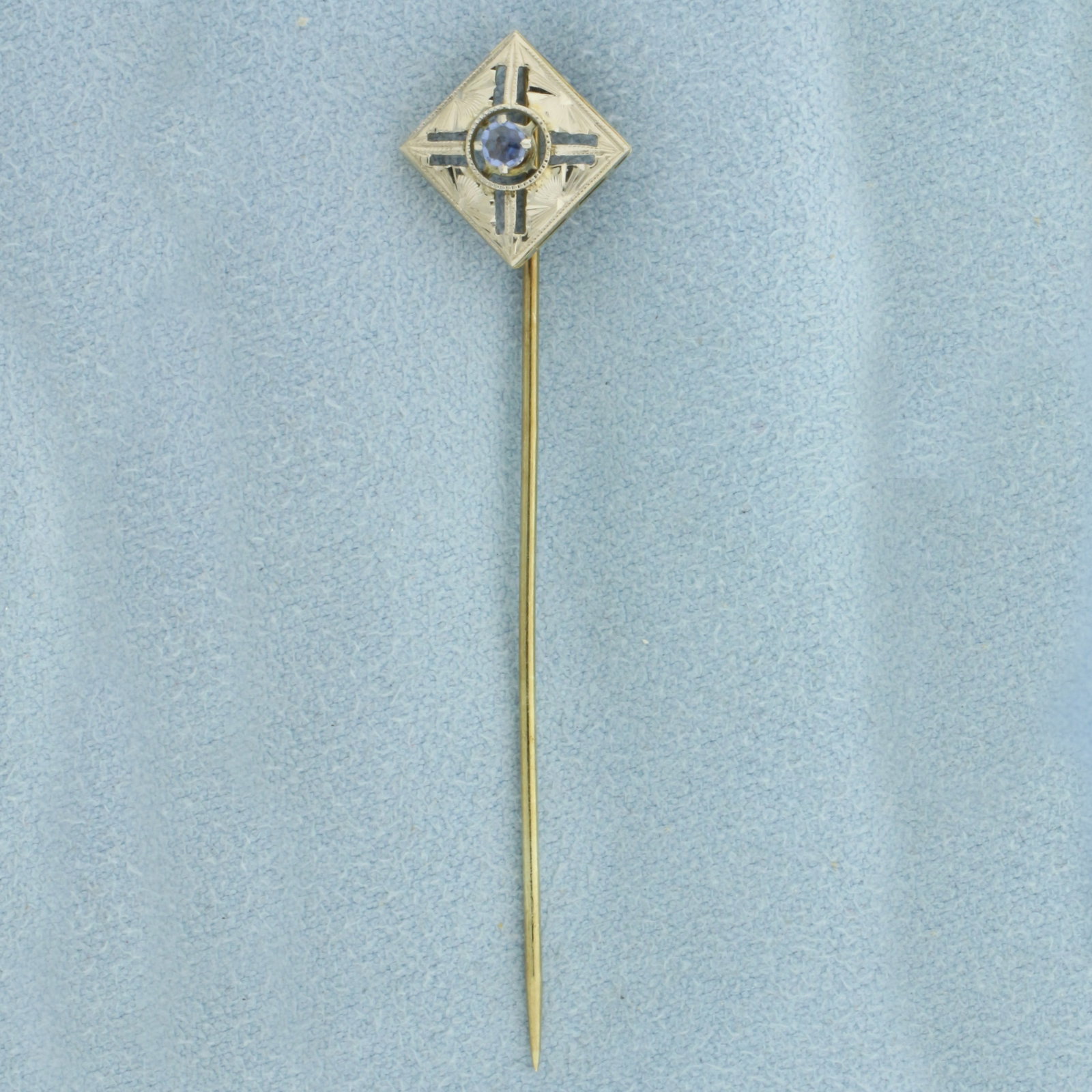Antique Art Deco Sapphire Stick Pin in 14k White and Yellow Gold: In 14k white and yellow. Contains one old cut .10ct sapphire gemstone with vibrant color and excellent clarity. Measures 2 3/8 inches long by 1/2 inch wide.