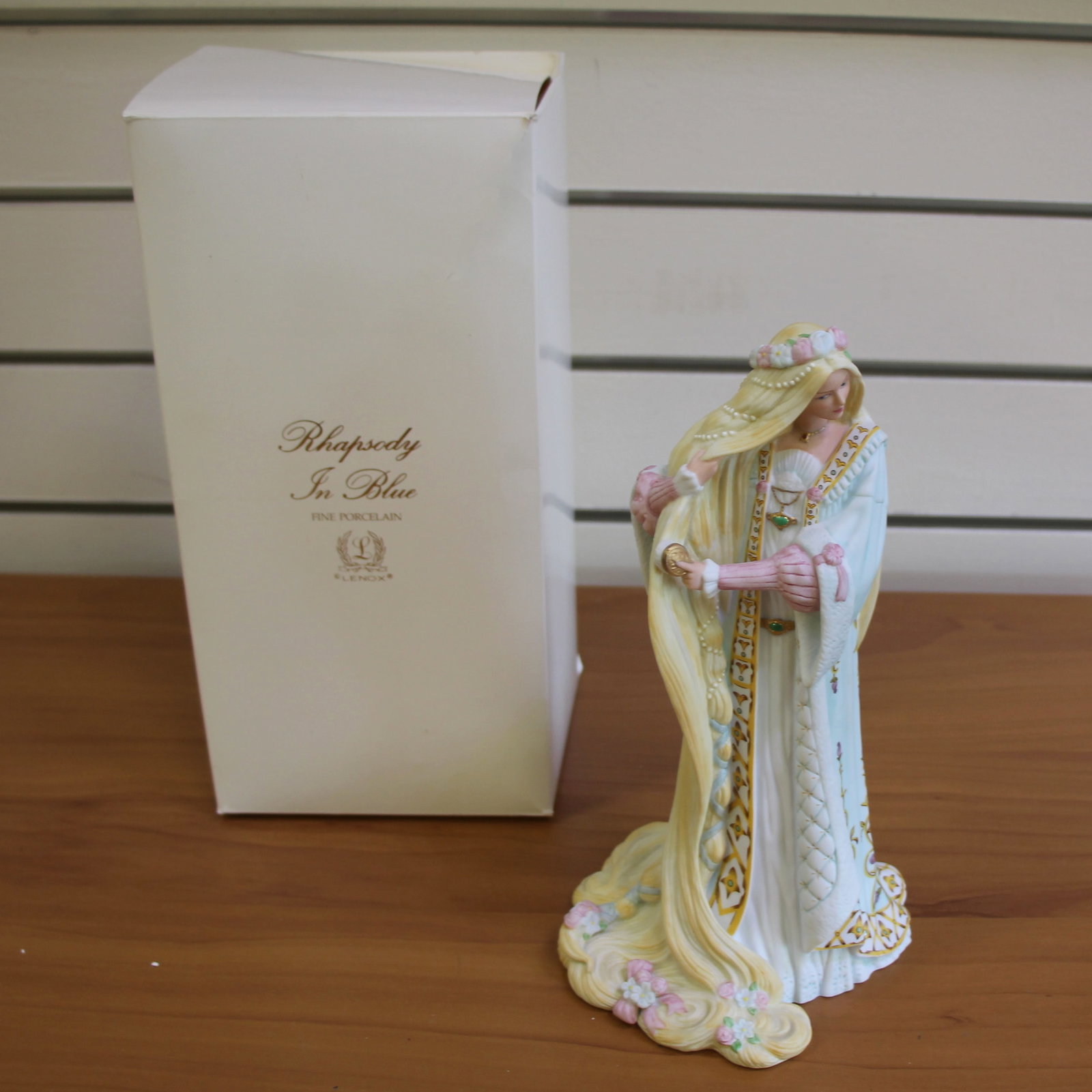Lenox Rhapsody In Blue "Rapunzel" Fine Porcelain Figurine The Legendary Princesses: Fine Porcelain. 8 3/4 inches tall, 4.5 inches wide. No defects, in great condition. Comes with original box as shown in picture.
