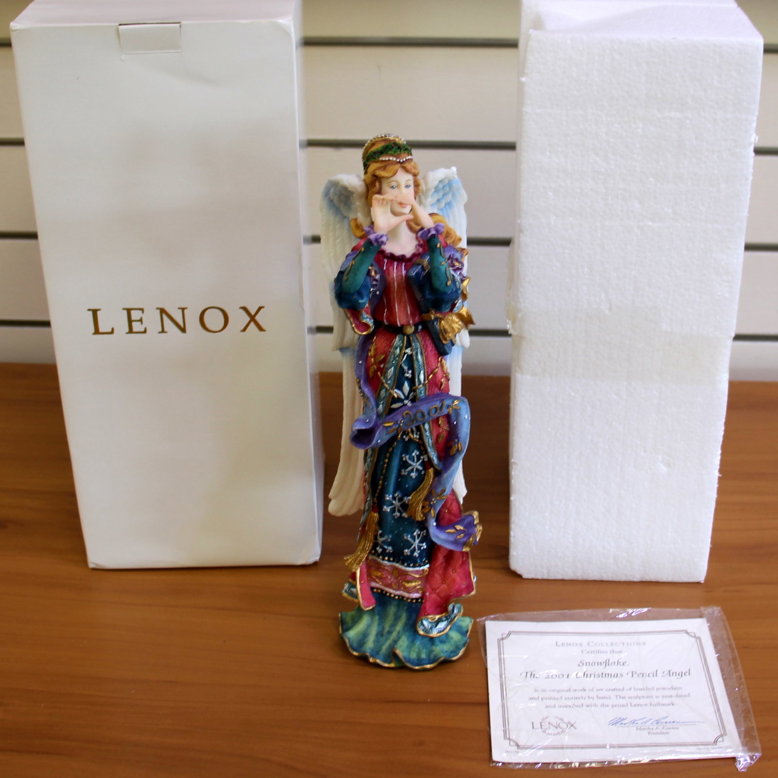 Lenox Snowflake The 2001 Christmas Pencil Angel Fine Porcelain Figurine: Fine Porcelain. 11.5 inches tall, 3 inches wide. No defects, in great condition. Comes with original box as shown in picture.
