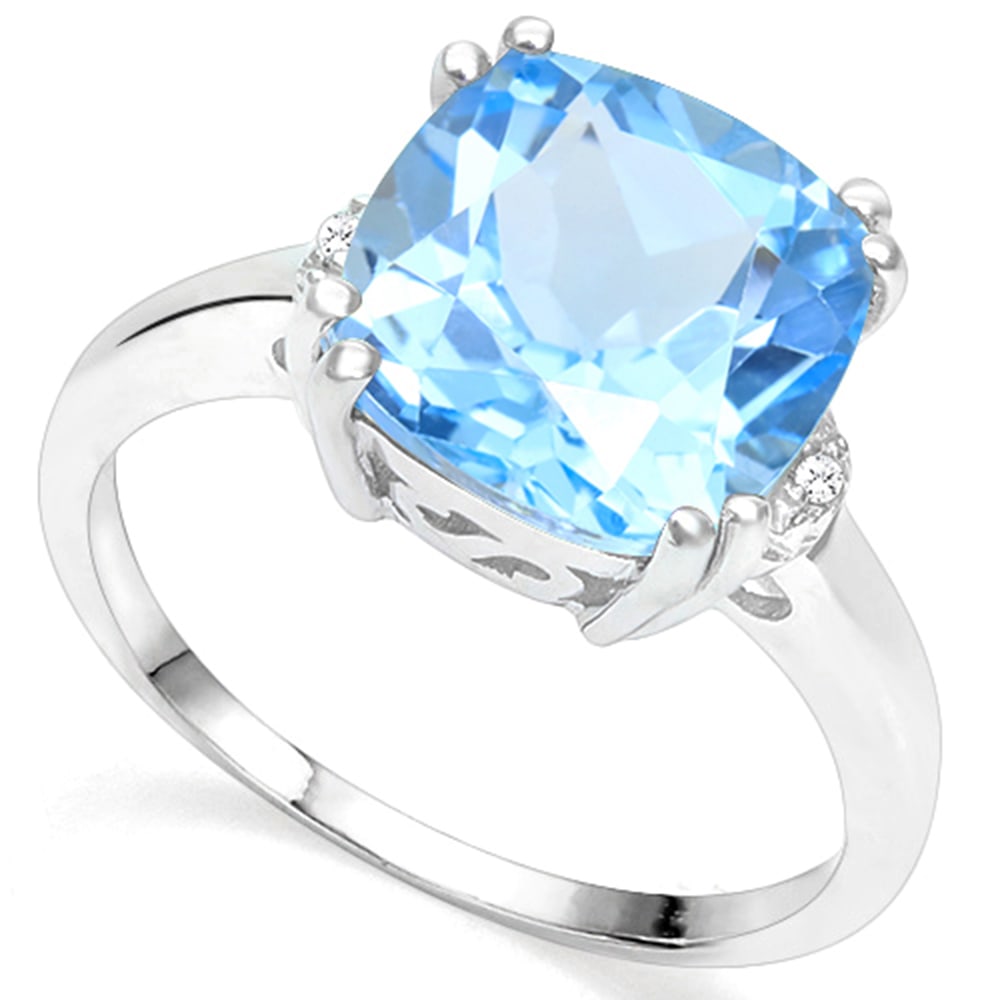 Huge 7CT Baby Swiss Blue Topaz & Diamond Ring in Sterling Silver: Cushion cut 7ct baby Swiss blue topaz gemstone ring, accented with .01ctw genuine diamonds. Size 6. Set in platinum over sterling silver, 3.1g.
