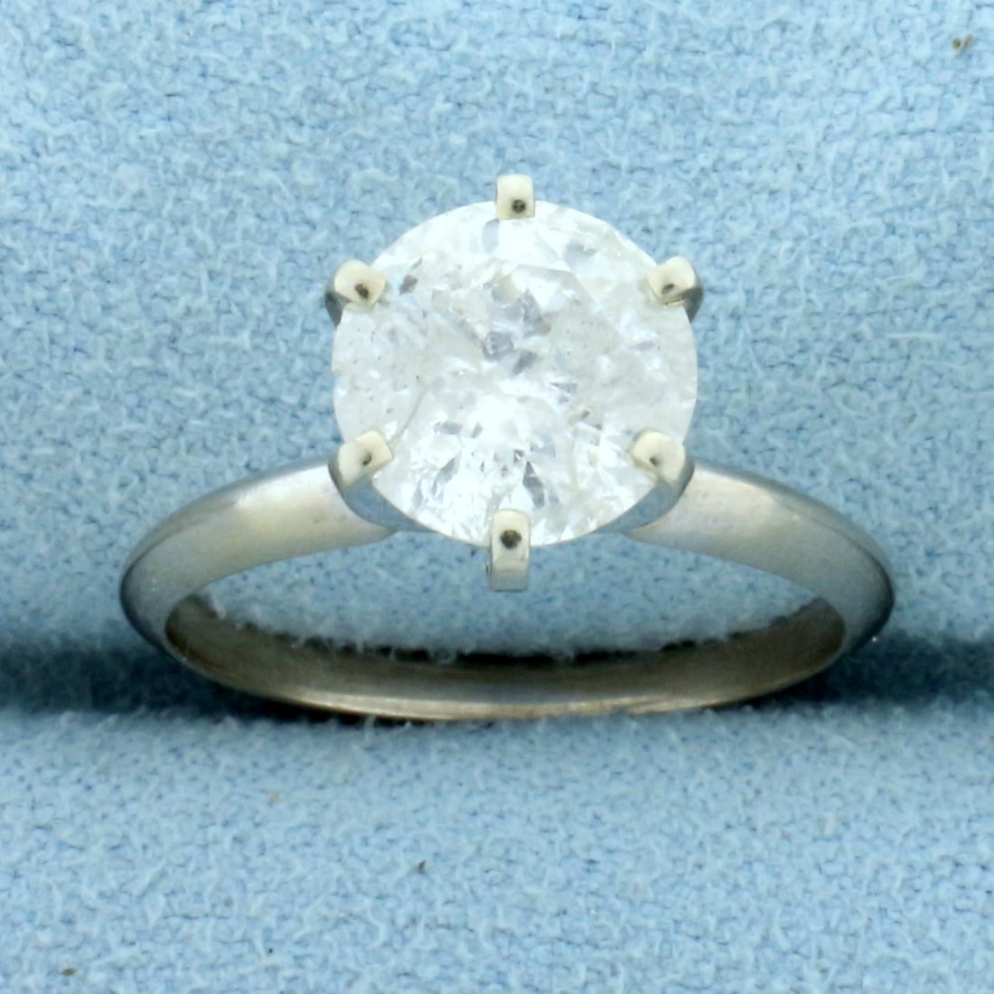 Over 2ct Solitaire Diamond Engagement Ring in 14K White Gold: In 14K White Gold. Contains one high quality 2 1/3ct round brilliant cut Diamond, H color/I2 clarity. Stone faces up great and looks huge. Great value. Size 6 1/2. 2.9g