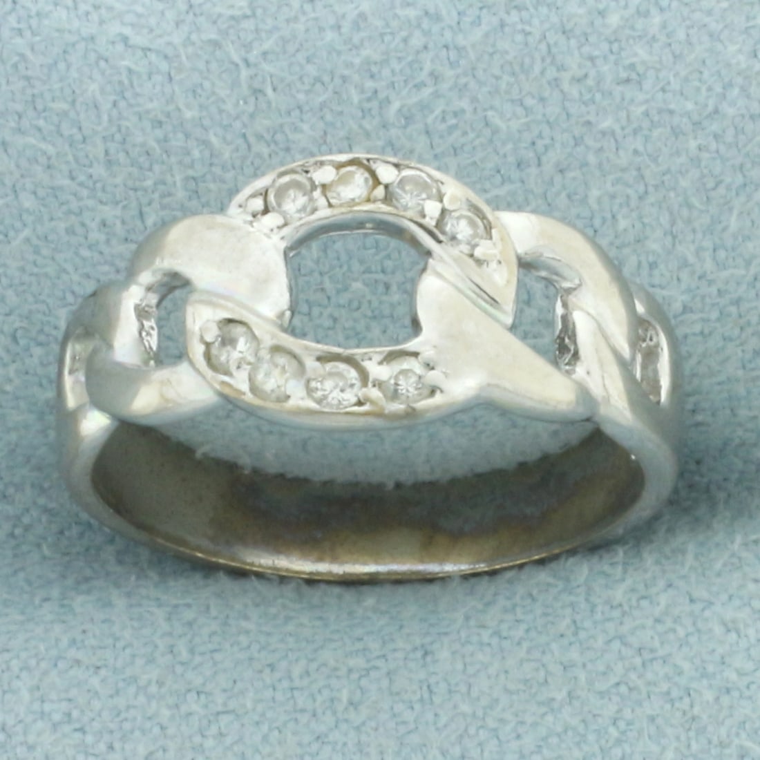 Vintage Cable Link Ring in Sterling Silver: In sterling silver. Contains 8 high quality .02ct CZ gemstones. Size: 7. 2.9g.