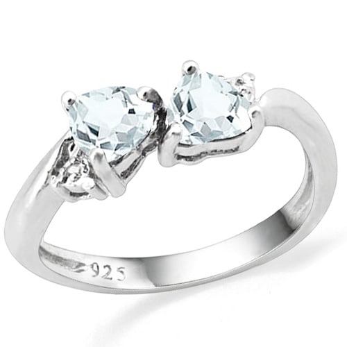 Heart Cut Aquamarine and Diamond Toi Et Moi Ring in Sterling Silver: Platinum over sterling silver. Contains 2 heart cut aquamarine gemstones, 2/5CTW, with light aqua color. Accented with .01ctw genuine diamonds. Size 7. 2.0g
