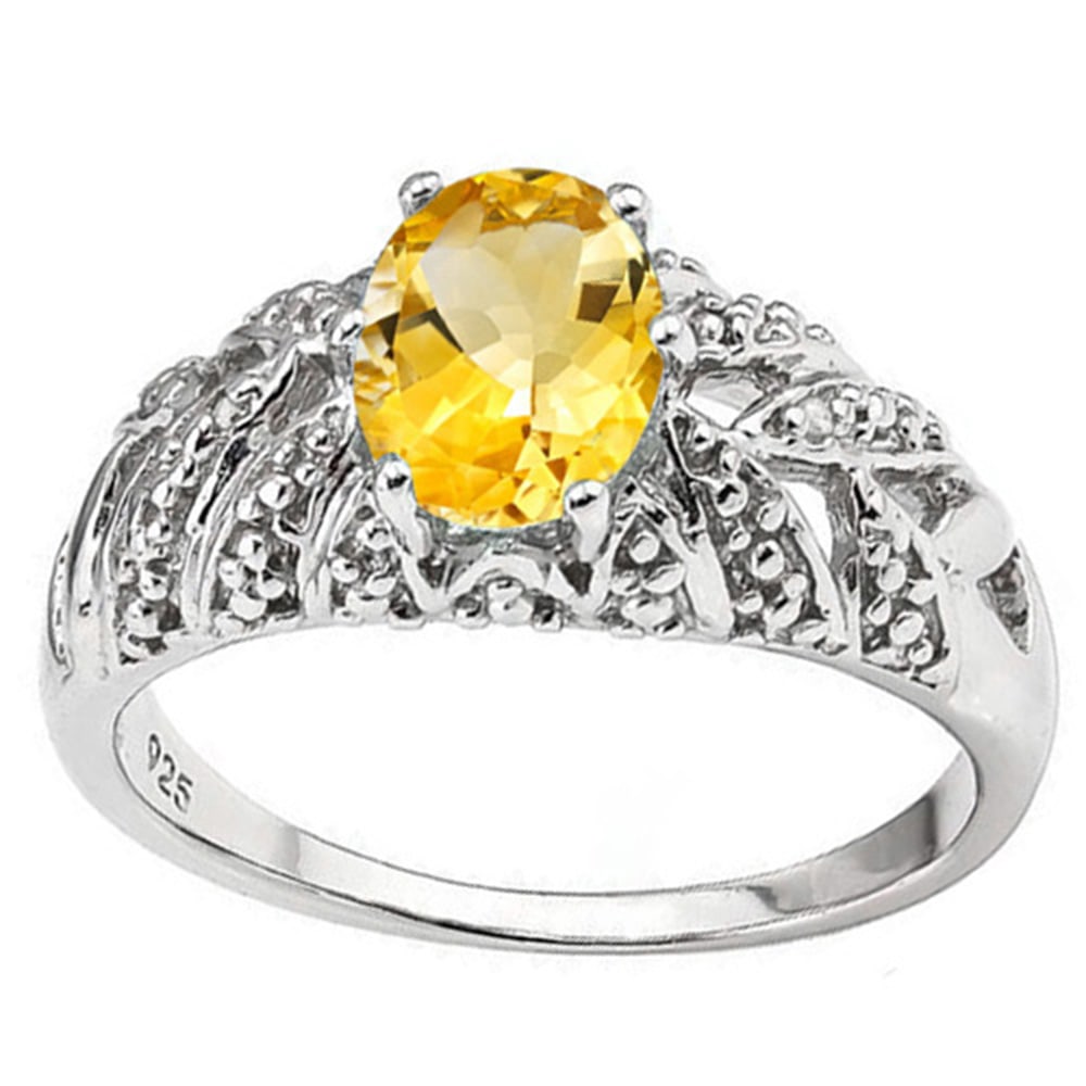 1CT Oval Cut Citrine and Diamond Lace Effect Ring in Platinum over Sterling Silver: In platinum over sterling silver. Contains one oval cut citrine, 1ct, with excellent color and clarity. Accented with 2 genuine diamonds, .01ctw. Size 7. 3.4g
