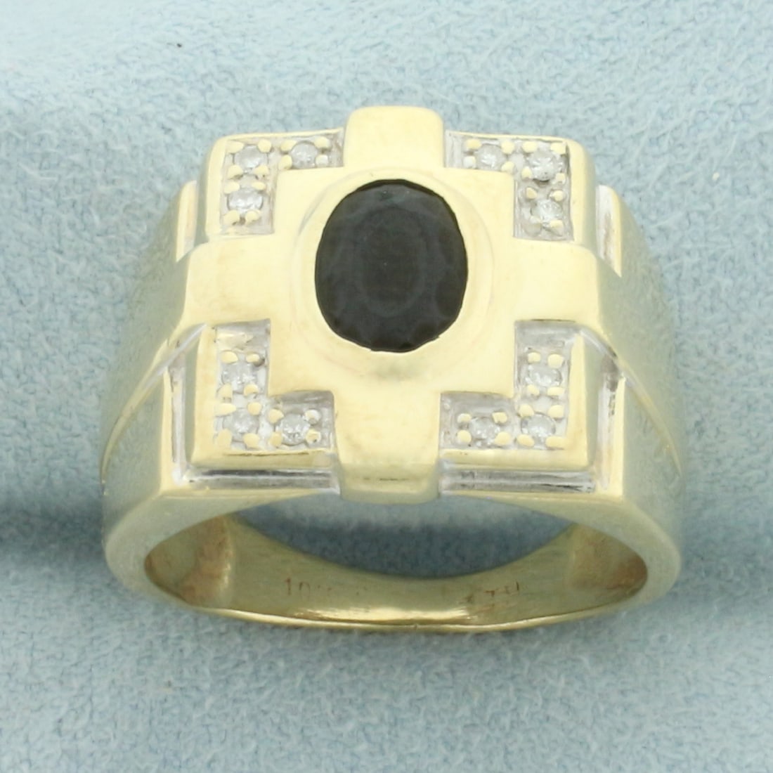 Mens Vintage Green Tourmaline and Diamond Ring in 10k Yellow Gold: In 10k yellow gold. Contains 1 high quality natural 8mm by 6mm 1.5ct oval cut green tourmaline gemstone with deep green color and excellent clarity. Also contains 12 half point diamonds. 16.2mm wide a