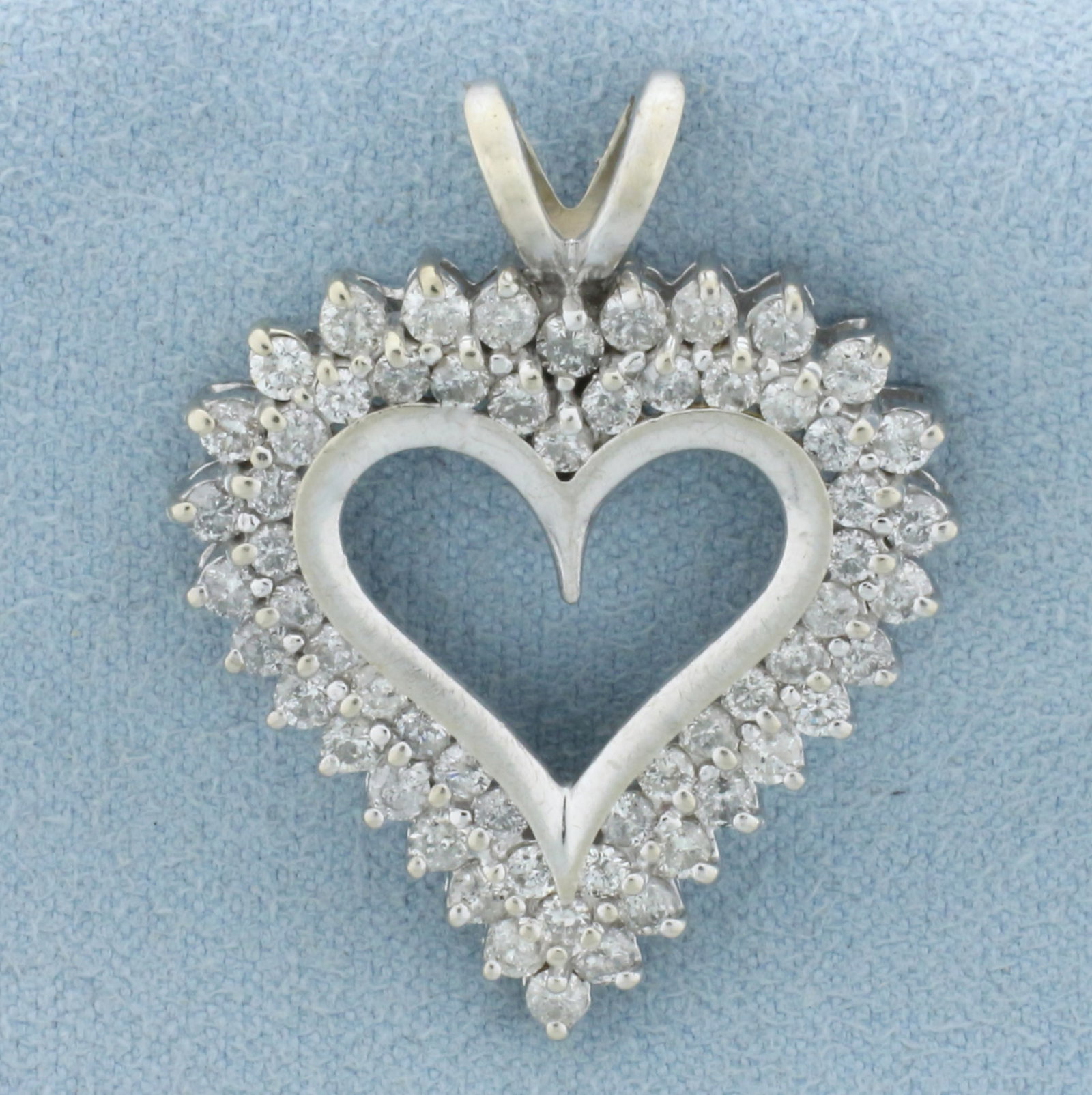 2ct Diamond Double Row Heart Pendant in 10k White Gold: In 10k white gold. 1 1/4 inches long x 1 inch wide. Contains sixty high quality round brilliant diamonds, 2ct TW, G color/I1 clarity. 4.3g.