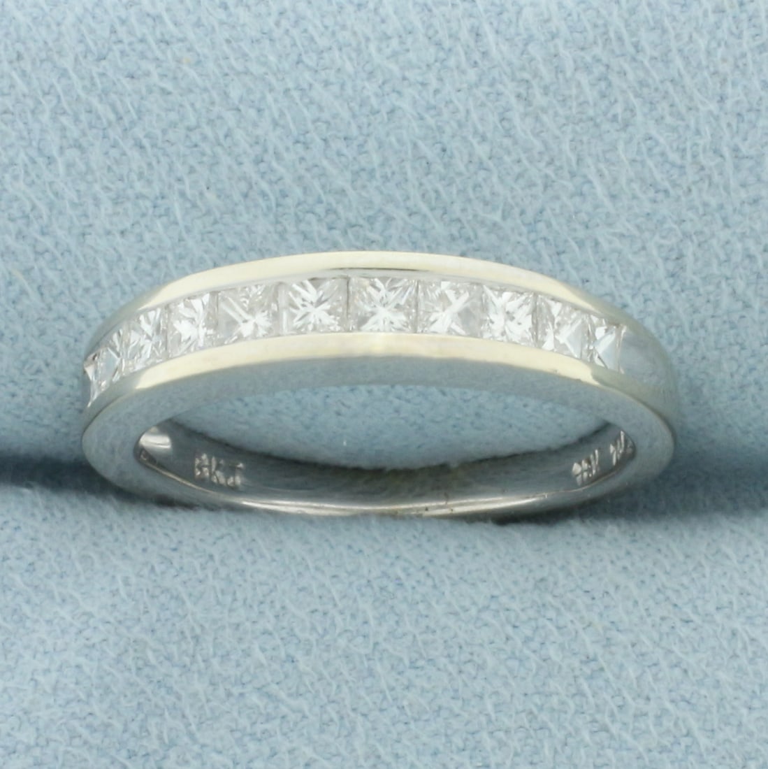Princess Diamond Anniversary or Wedding Band Ring in 18k White Gold: In 18k white gold. Contains 11 high quality princess cut diamonds, 1/2ct TW, VS clarity/G color, great cut for lots of sparkle. Size: 7.5. 4.7g.