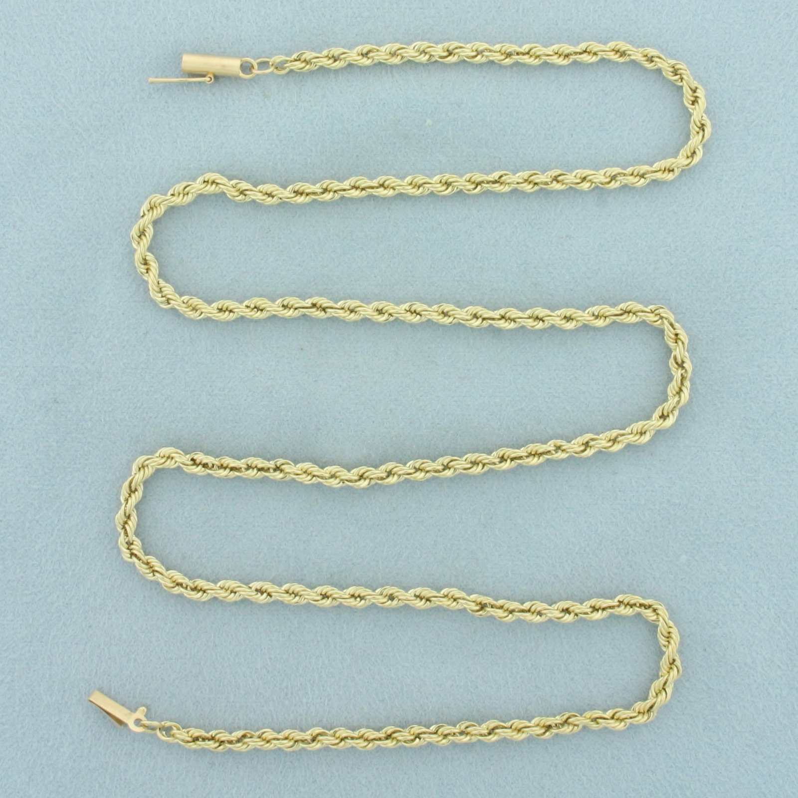 20" Inch Rope Link Chain Necklace in 14k Yellow Gold: In 14k yellow gold. 20 inches long and 3mm wide. Barrel clasp with safety latch. 5.3g.
