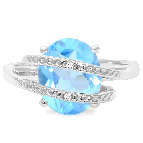 3D Sky Blue Topaz & Diamond Statement Ring in Sterling Silver: In platinum over sterling silver. Contains one 9x11mm oval cut sky blue topaz with excellent clarity and light blue color. Accented by 2 diamonds, .01ctw. Size 7. 3.9g