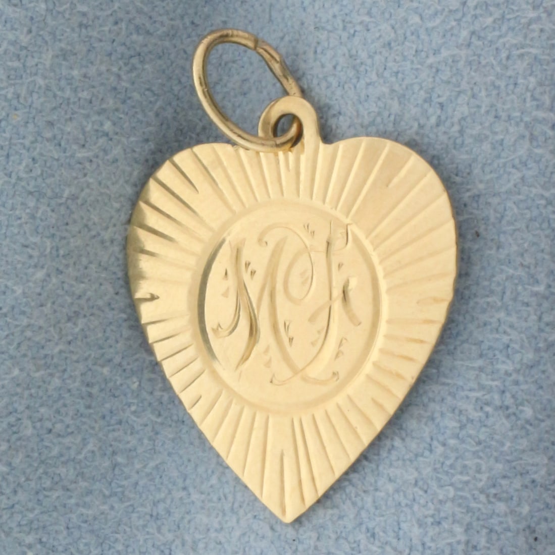 Vintage MF Initial Heart Charm in 14k Yellow Gold: In 14k yellow gold. 1 inch long (including jump ring) x 11/16 inches wide. 1.8g.