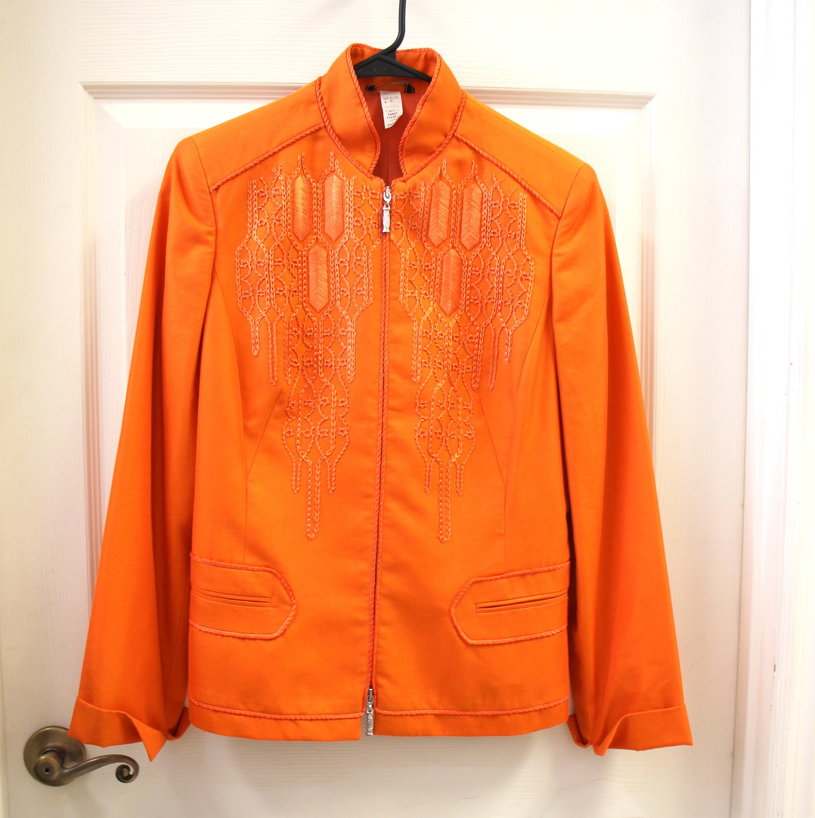 Versace Orange Embroidered Zip Jacket: Size 46. Vintage Versace jacket. 32453, 112584, 305960. Silver toned zipper with accented zipper pull. Detailed heavy embroidery work throughout jacket. Fully lined inside. In great vintage condition 