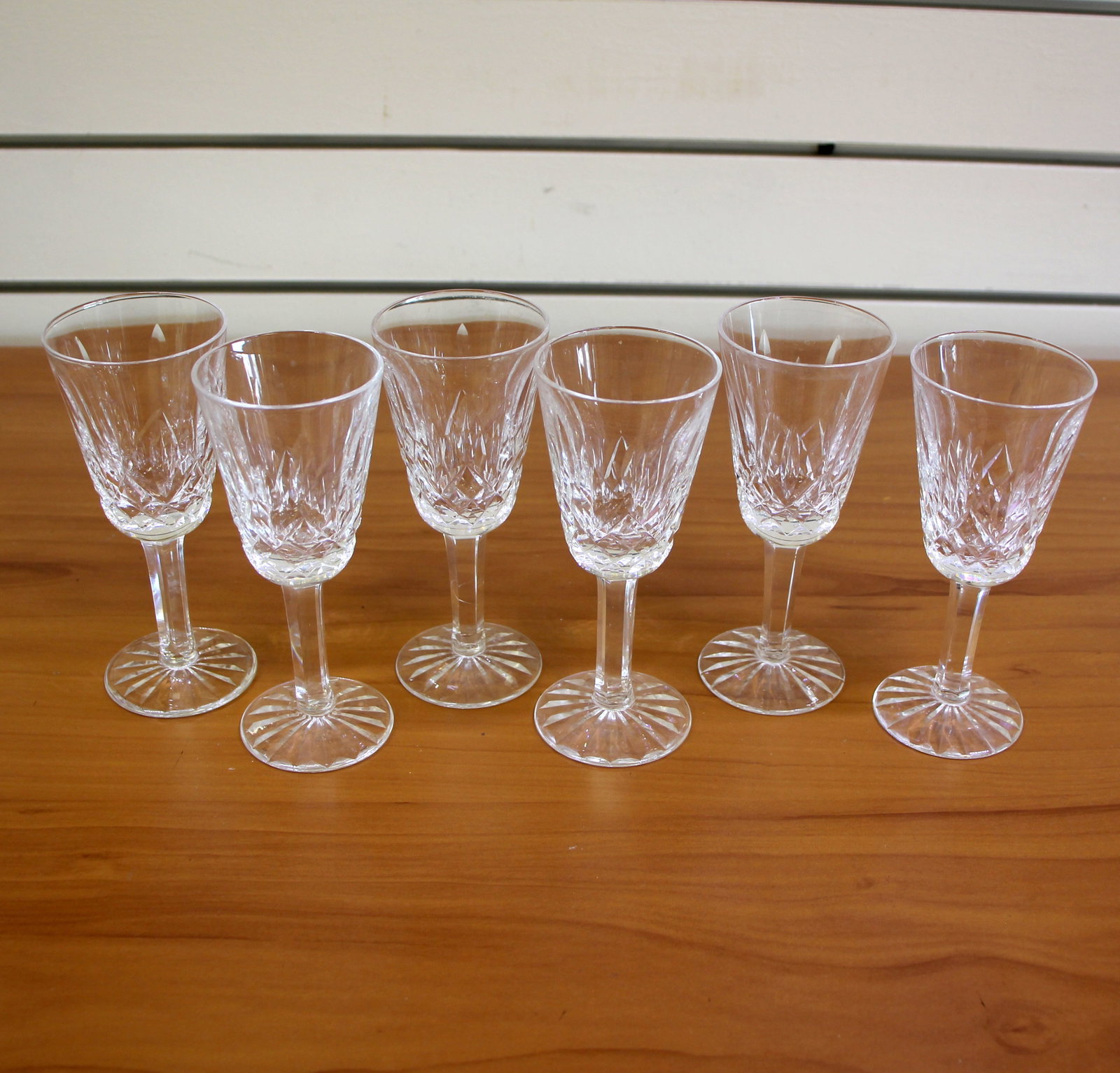 Waterford Lismore Crystal Sherry Glasses Set of 6: Height: 5 1/8 inches, and width: 2 1/8. Old Gothic letter markings. No defects.