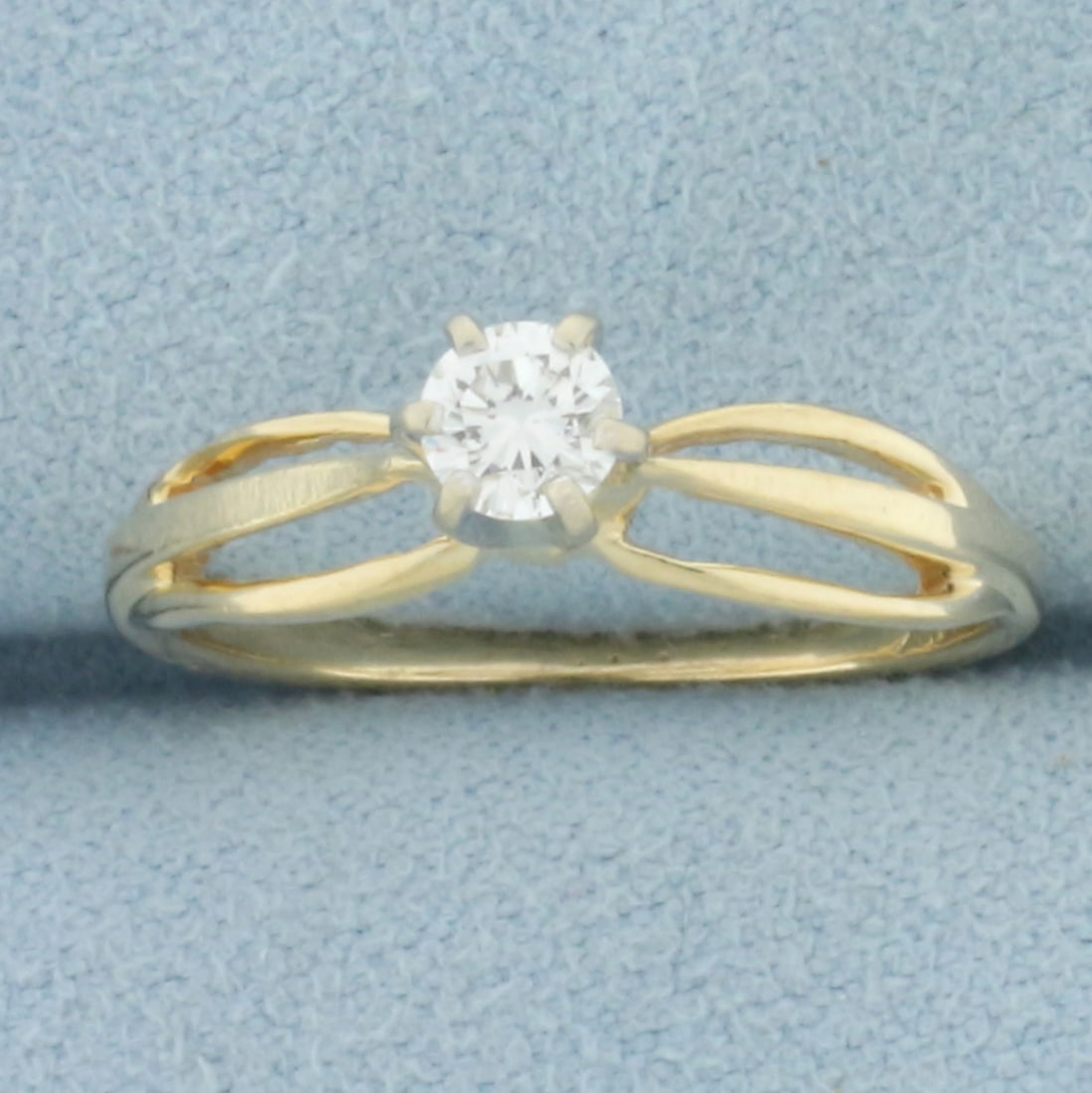 Diamond Solitaire Engagement Ring in 14k Yellow Gold: In 14k yellow gold. Contains one high quality 1/4ct round brilliant diamonds, VS clarity/G color, great cut for lots of sparkle, eye clean. Size: 6. 1.9g.