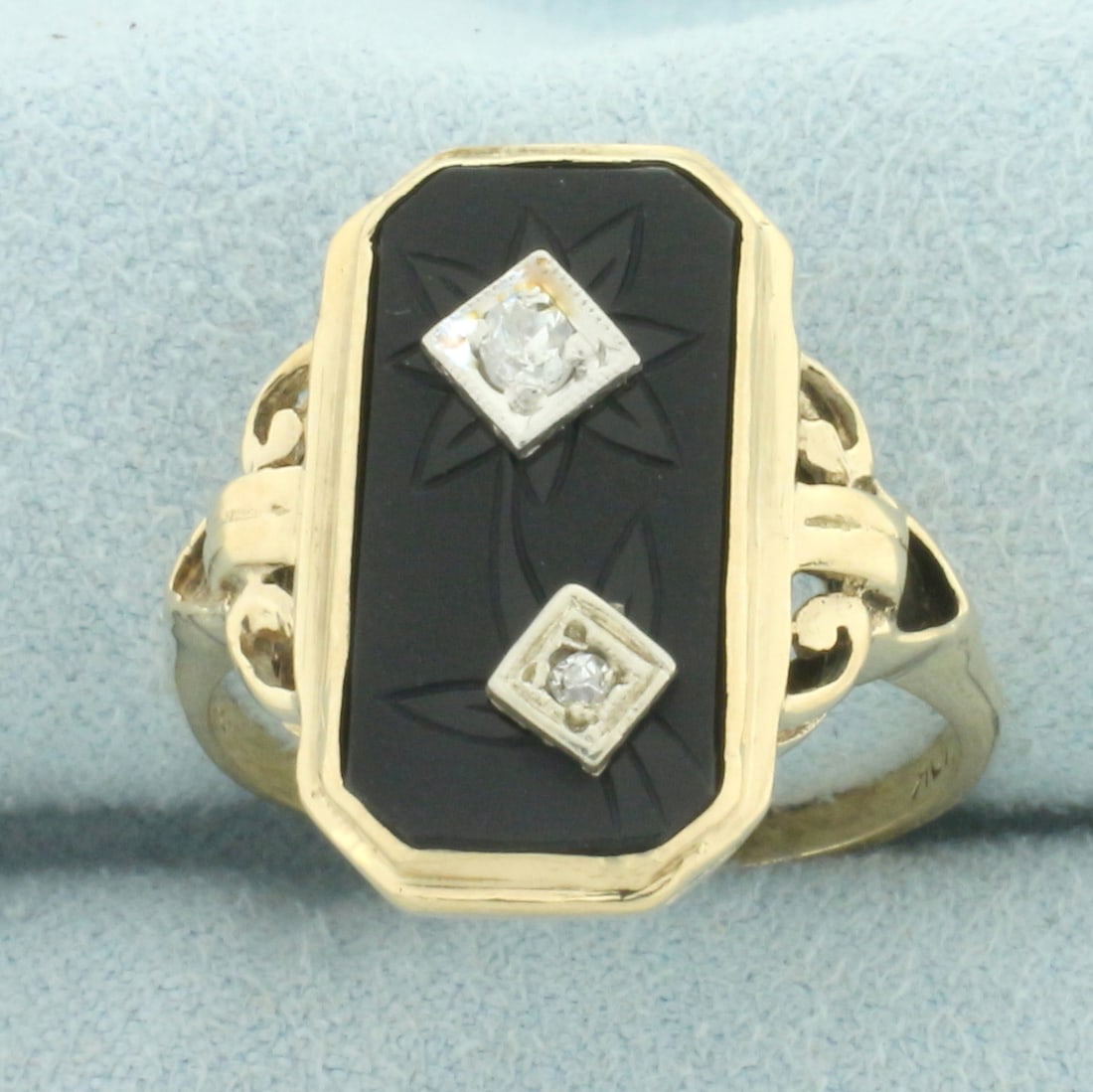 Antique Flower Etched Onyx and Diamond Ring in 10k Yellow Gold: In 10k yellow gold. Contains one .07ct and one .03ct high quality Old European cut diamonds, SI clarity/H color. Onyx plaque with etched flower design, 17mm x 9mm. Size: 8.5. 3.7g.
