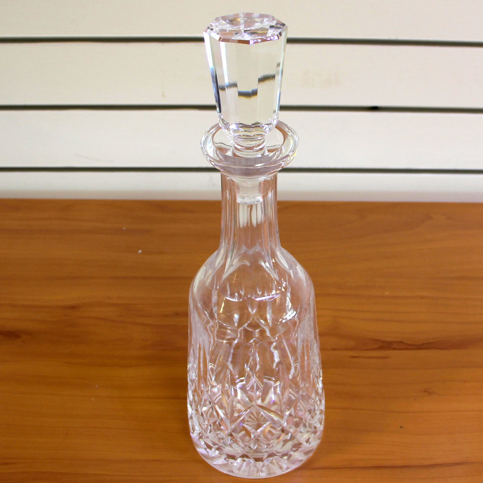 Waterford Lismore Decanter: Height: 13 inches, and width 4 inches. Old gothic lettering Waterford mark. No defects.