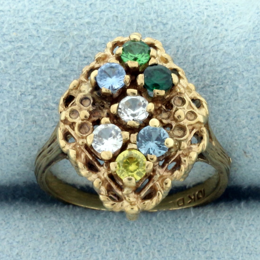 3/4ct TW Multi Colored Topaz Ring in 10K Yellow Gold: In 10K Yellow Gold. Contains seven high quality natural 3mm topaz gemstones, all different vibrant colors with excellent clarity. Size 6 1/2. 4.2g
