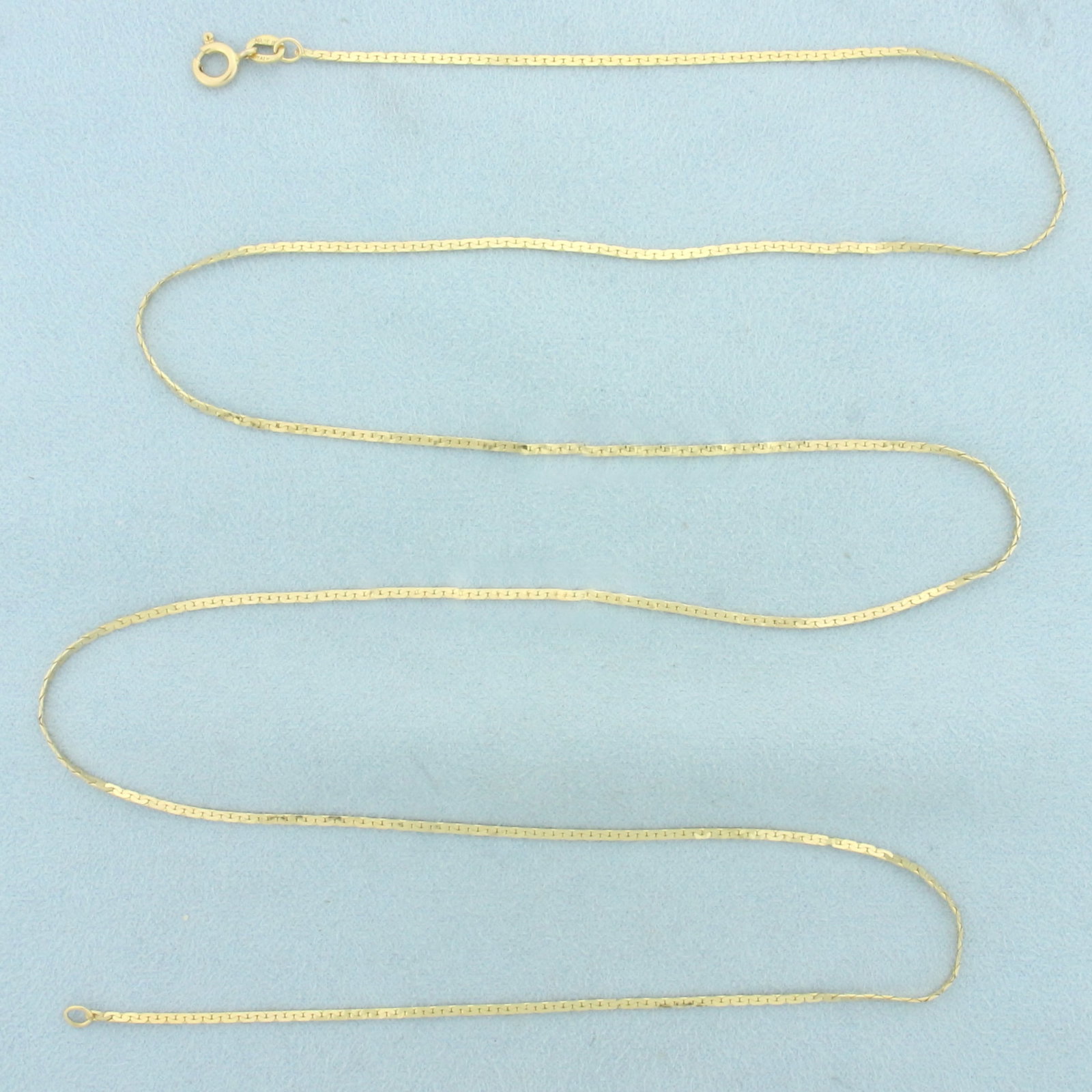30 Inch Italian C Link Chain Necklace in 14k Yellow Gold: In 14k yellow gold. 30 inches long and 1.3mm wide. Italian made. Spring clasp. 4.8g.