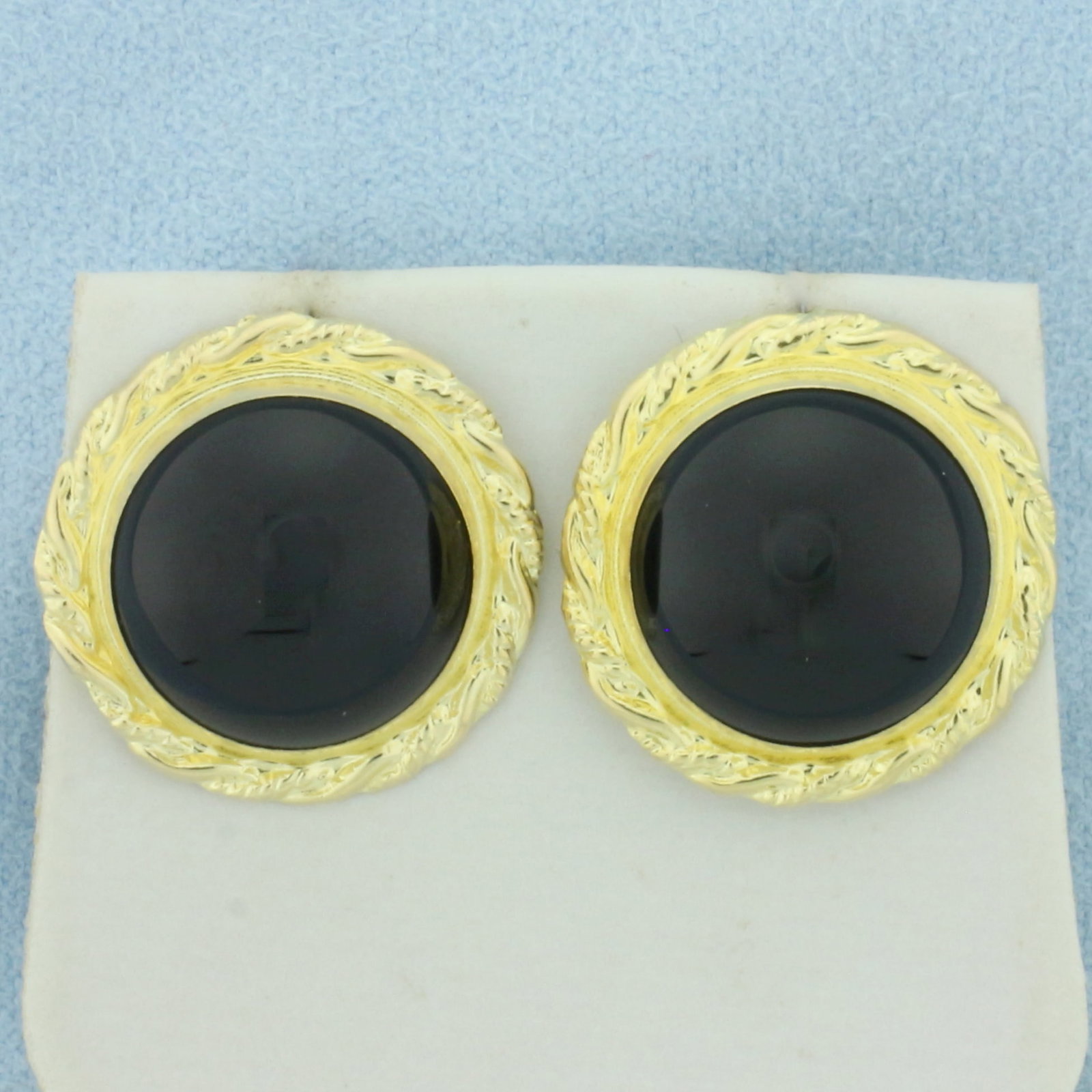 Onyx Statement Button Earrings in 14k Yellow Gold: In 14k yellow gold. Contains two high quality 15mm Onyx gemstones. 3/4 inch diameter. New 10k yellow gold friction backs. 5.1g.