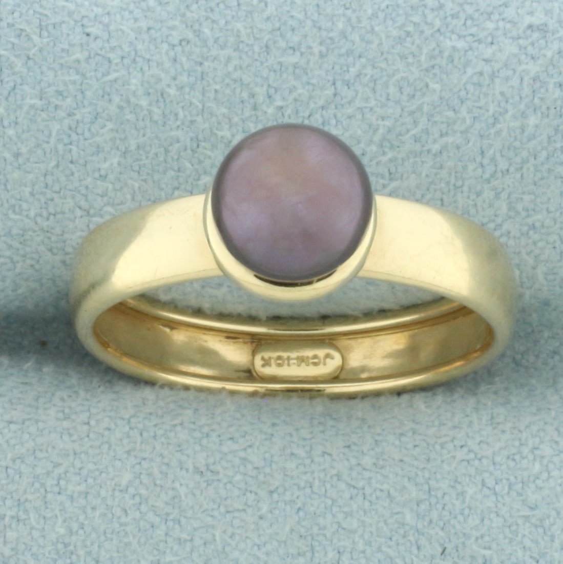 7MM Tahitian Pearl Solitaire Ring in 10k Yellow Gold: In 10k yellow gold. Contains one high quality 7mm Tahitian pearl with beautiful color and high luster. Band is 4mm wide. Size: 8. 1.4g.