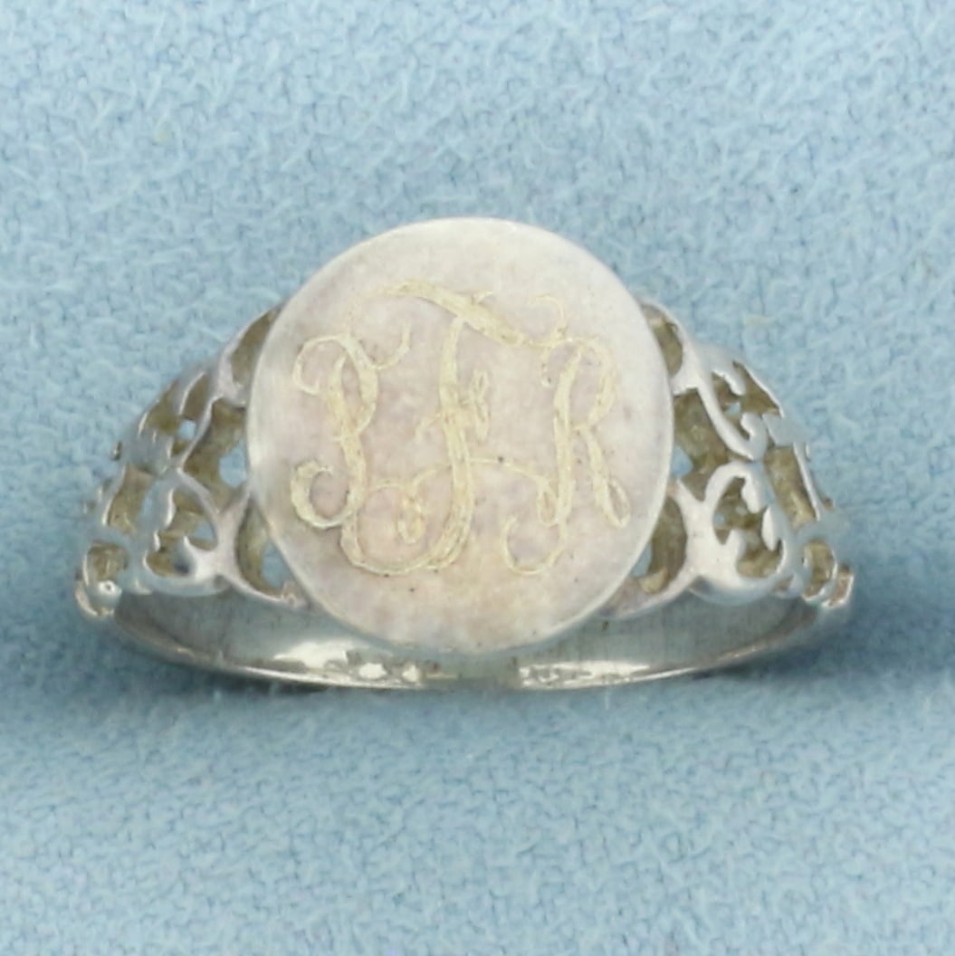 Antique Monogramed Ring in Sterling Silver: In .925 sterling silver. 11mm wide at top. Monogrammed "PRF" Size: 7. 3.0g