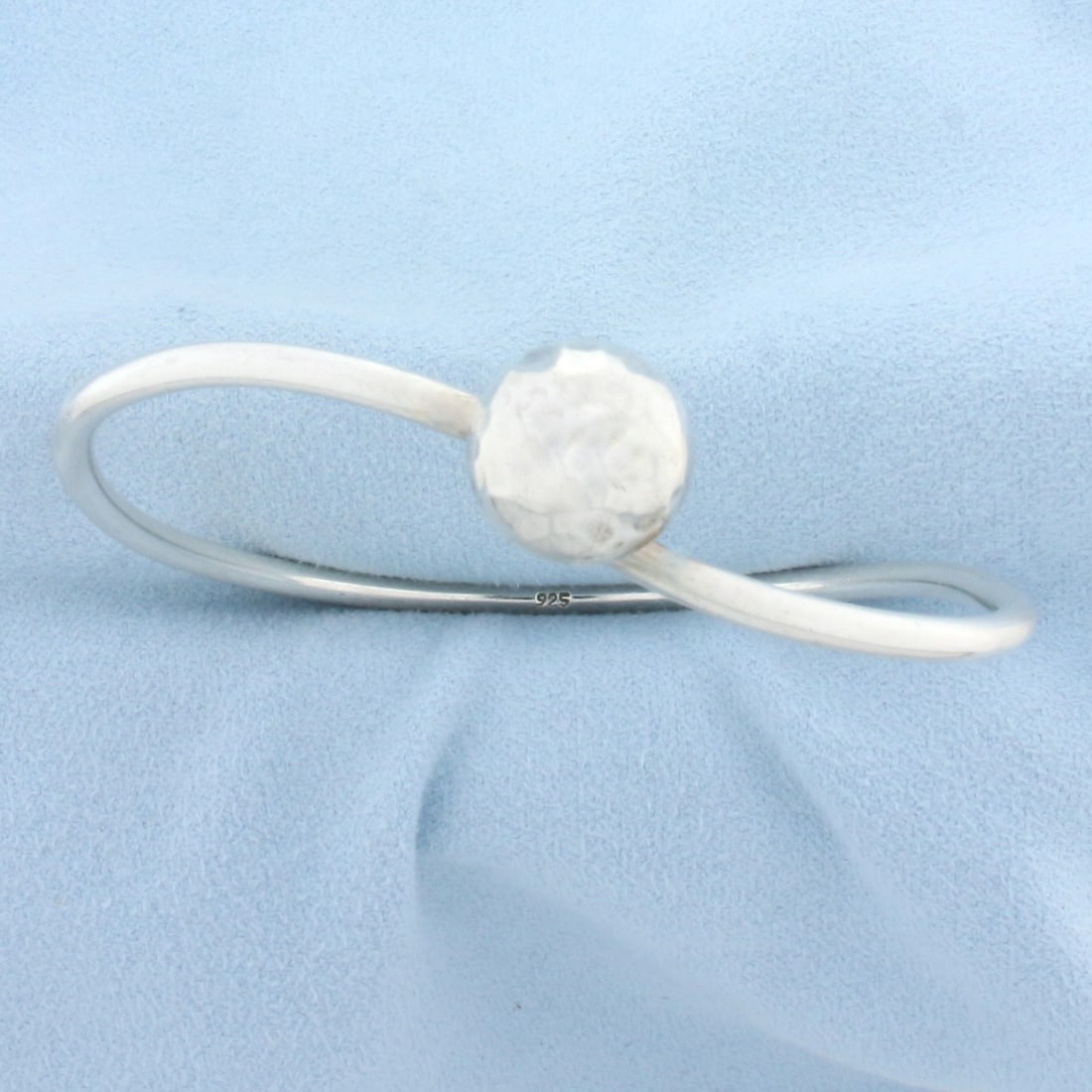Hammered Finish Bead Bangle Bracelet in Sterling Silver: In .925 sterling silver. 2 1/2 inch inner diameter and 2.8mm wide. 12mm bead. 13.8g