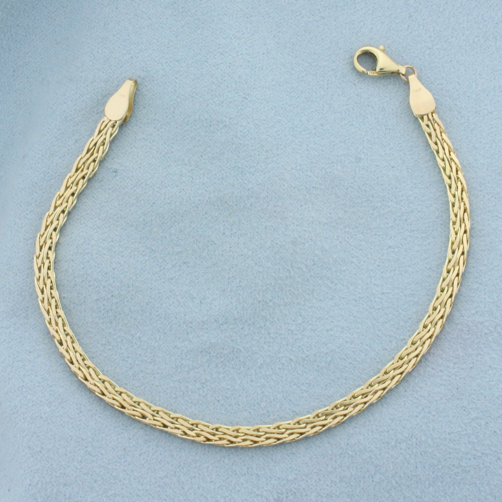 Double Foxtail Wheat Link Bracelet in 14k Yellow Gold: In 14k yellow gold. 7 inches long and each chain is 1.3mm wide. Lobster clasp. 6.4g.
