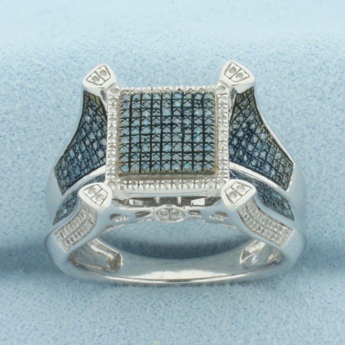 Blue and White Diamond Pave Set Ring in Sterling Silver: In .925 sterling silver. Contains 1/2ct TW of high quality blue and white diamonds with great color and excellent clarity. 1/2 inches wide at top of ring. Size: 8. 8.4g.