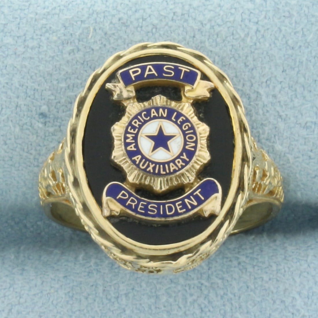 Vintage American Legion Auxiliary Past President Ring in 10k Yellow Gold: In 10k yellow gold. Contains one high quality 16mm by 13mm Onyx Gemstone Plaque. 18.6mm wide at center. Detailed enamel design. Size: 6.5. 4.7g.