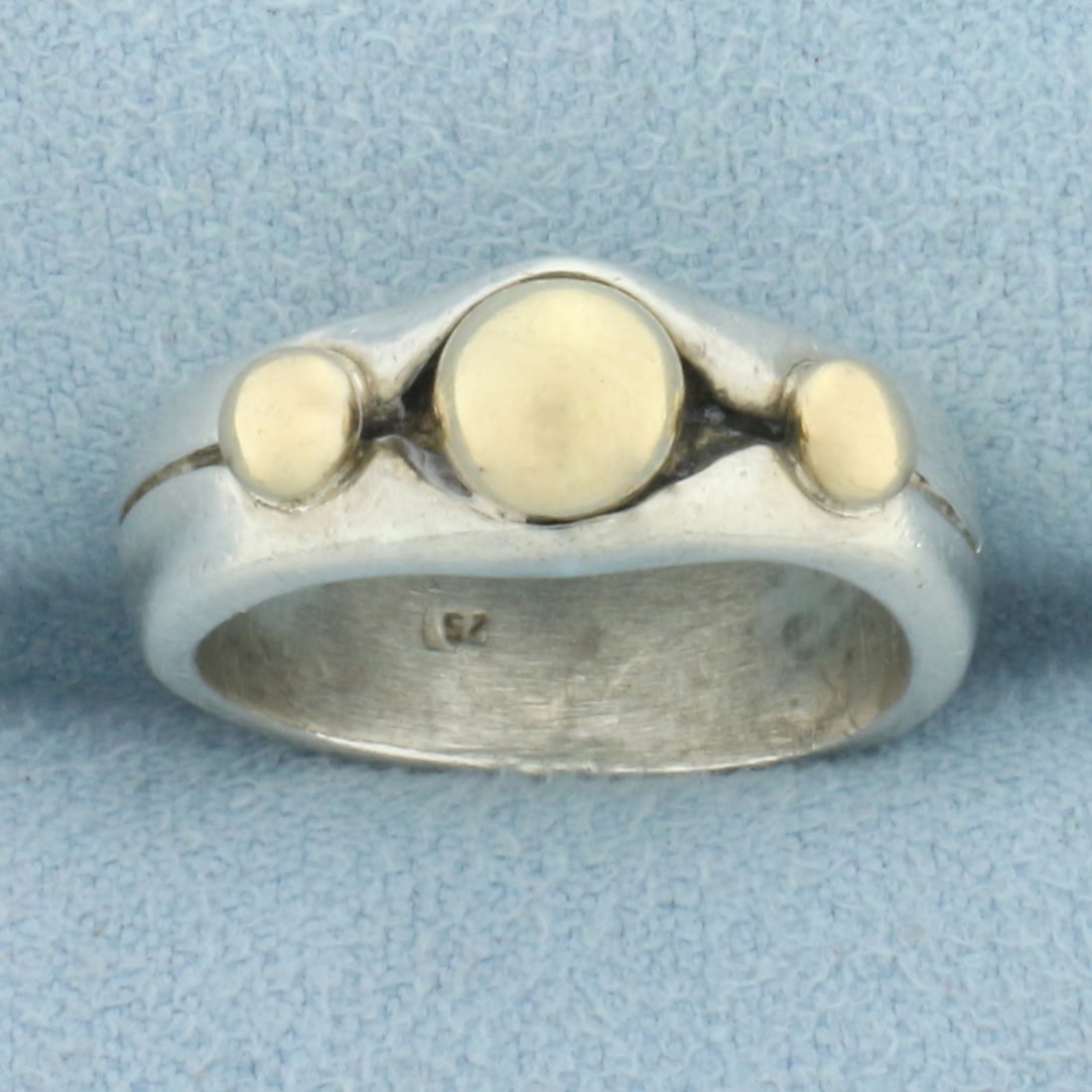 Vintage Hand Crafted Designer Ring in 14k Yellow Gold and Sterling Silver: In 14k yellow gold, and .925 sterling silver. 7mm wide at top. Size: 6. 6.4g.