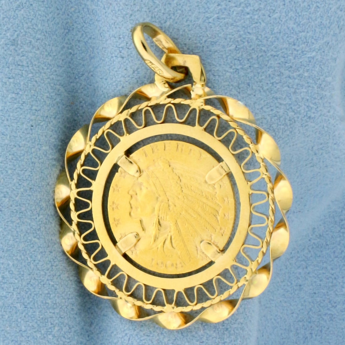 1908 Indian Head Gold Coin Pendant in 18k Yellow Gold Bezel: Italian 18k yellow gold bezel. 1908 2 1/2 dollar Indian Head coin, 90% pure gold. 1 5/8 inches long and 1 1/4 inches wide. 9.7g.