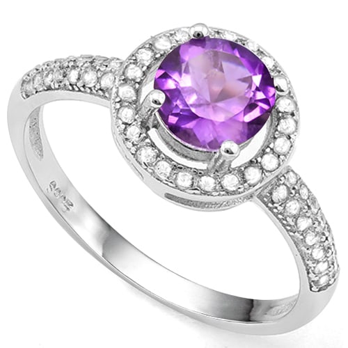 Over 1CTW Amethyst & White Sapphire Halo Ring in Sterling Silver: In platinum over sterling silver. Contains one round cut 3/4ct amethyst gemstone with excellent color and clarity. Accented with 2/5ctw white sapphires to create a halo design. Size 7. 1.9g