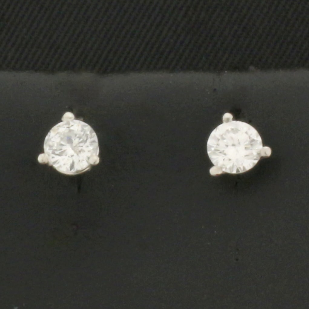 2/5ct Diamond Stud Earrings in Platinum Martini Settings: In platinum martini settings. Contains two high quality Round Brilliant Diamonds, .4ct TW, SI2 clarity/G color, eye clean, great cut for lots of sparkle. .7g