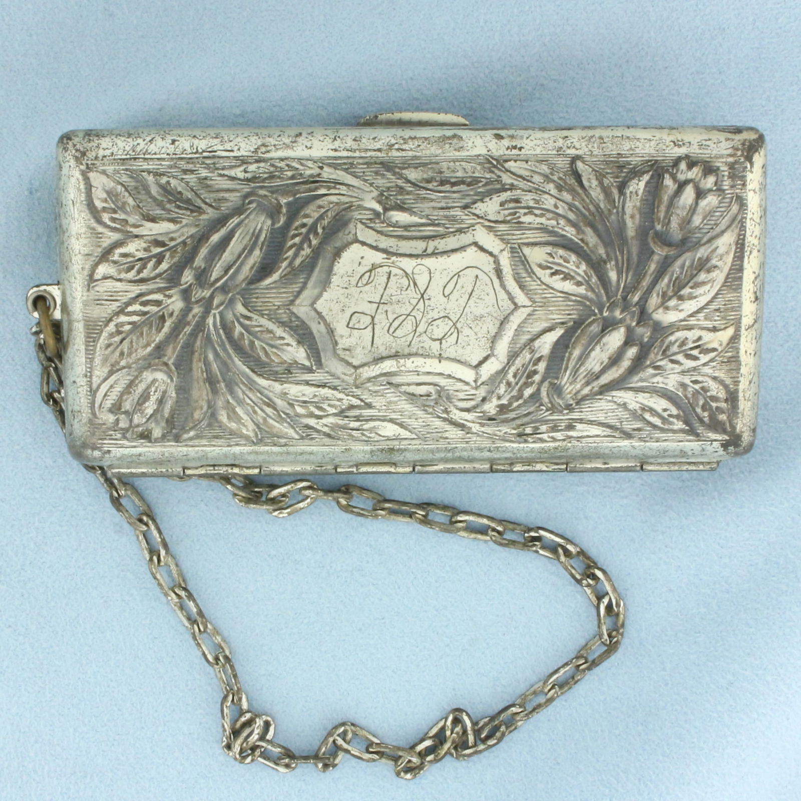 Antique Coin Case: In sterling silver plate. 3 3/8 inches wide and 1 3/4 inches high. Monogram as shown in picture.
