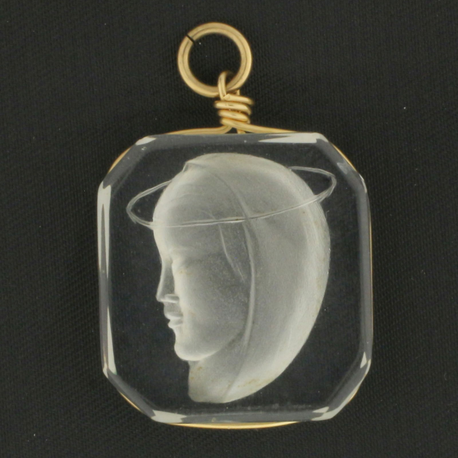 Intaglio Glass Carved Virgin Mary Cameo Charm or Pendant: 1 1/4 inch long (including bail) by 7/8 inch wide. 6.7g.