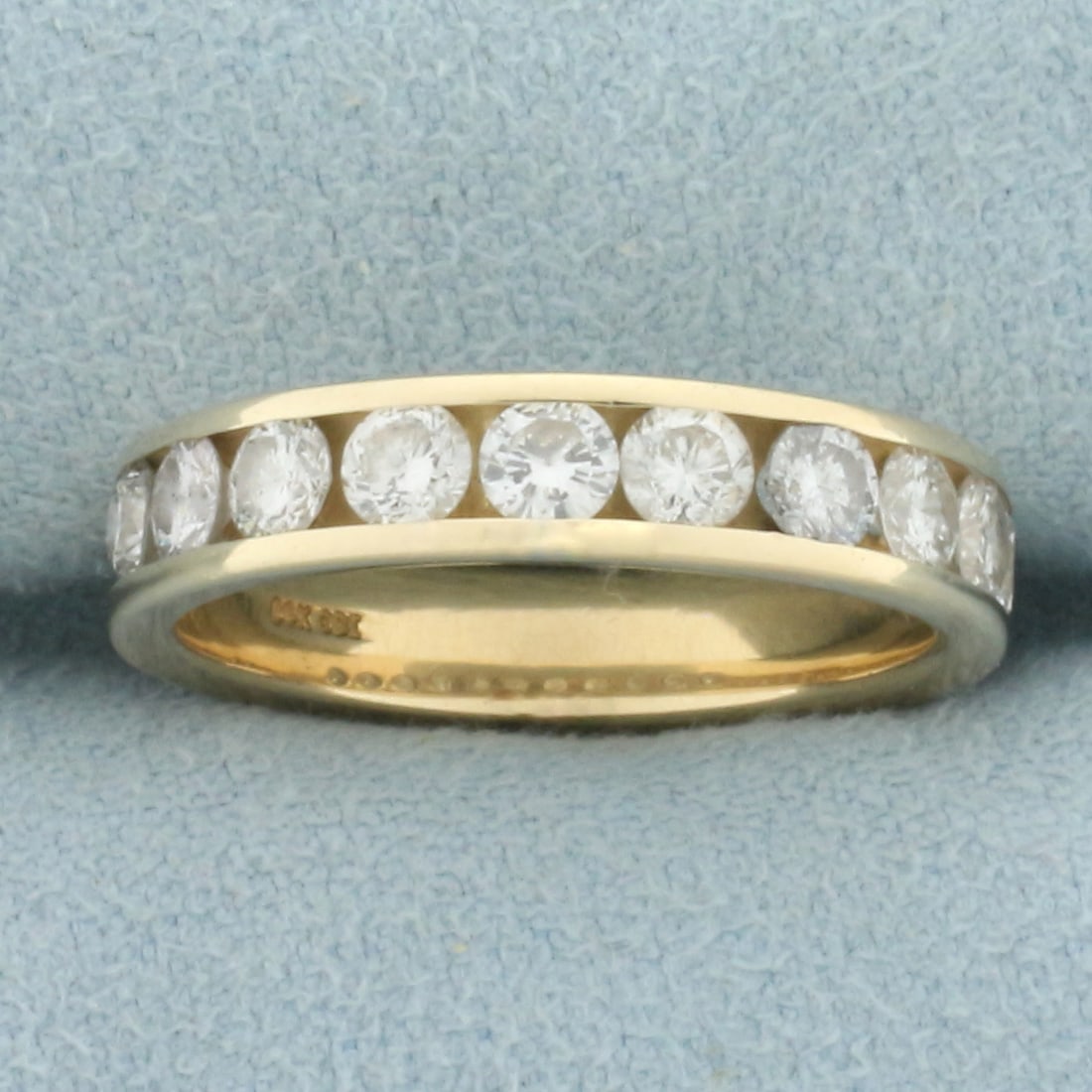 Diamond Wedding or Anniversary Band Ring in 14k Yellow Gold: In 14k yellow gold. Contains 11 high quality 1/8ct diamonds, 1 1/3ct TW, H color/I clarity. 4.3mm wide. Size: 7.25. 4.2g.