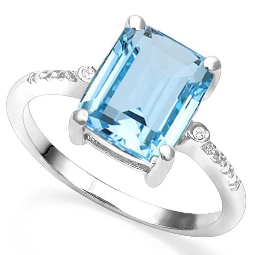 4CT Emerald Cut Sky Blue Topaz and Diamond Ring in Sterling Silver: In platinum over .925 sterling silver. Contains one 4ct sky blue topaz with excellent color and clarity. Accented with two genuine diamonds, .01ctw. Size 7. 3.0g