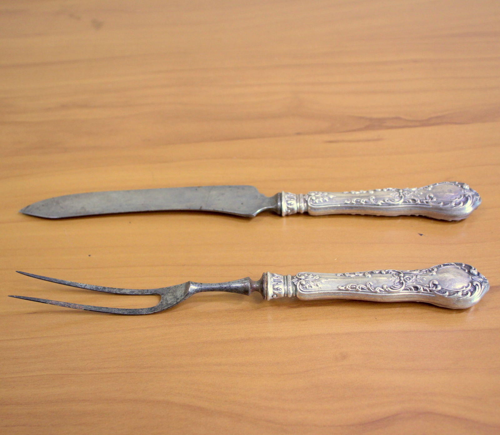 Gorham "H140" Sterling Silver Carving Set: In .925 Sterling Silver. Contains one 8.5 inch hollow handle carving fork and one 9.5 inch hollow handle craving spoon. Script monograms.