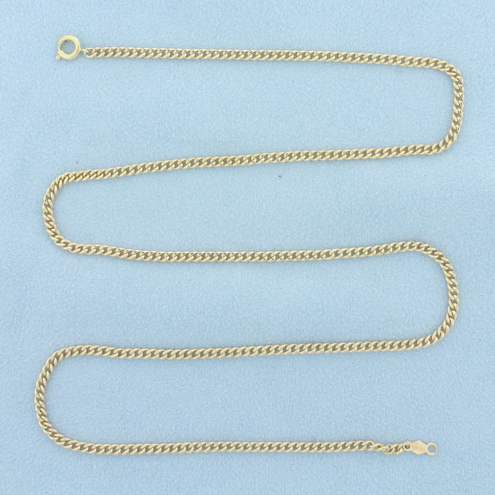 20 Inch Curb Link Chain Necklace in 14k Yellow Gold: In 14k yellow gold. 20 inches long by 2.5mm wide. Spring Clasp. 9.7g.