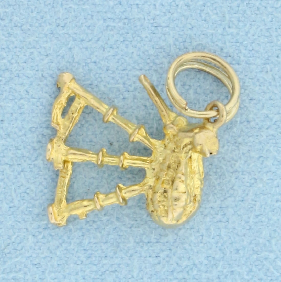 Vintage Scottish Bagpipe 3D Charm in 9k Yellow Gold: 9k yellow gold. 3/4 Inch long (including ring at top) by 1/2 Inch wide. 1.7g.