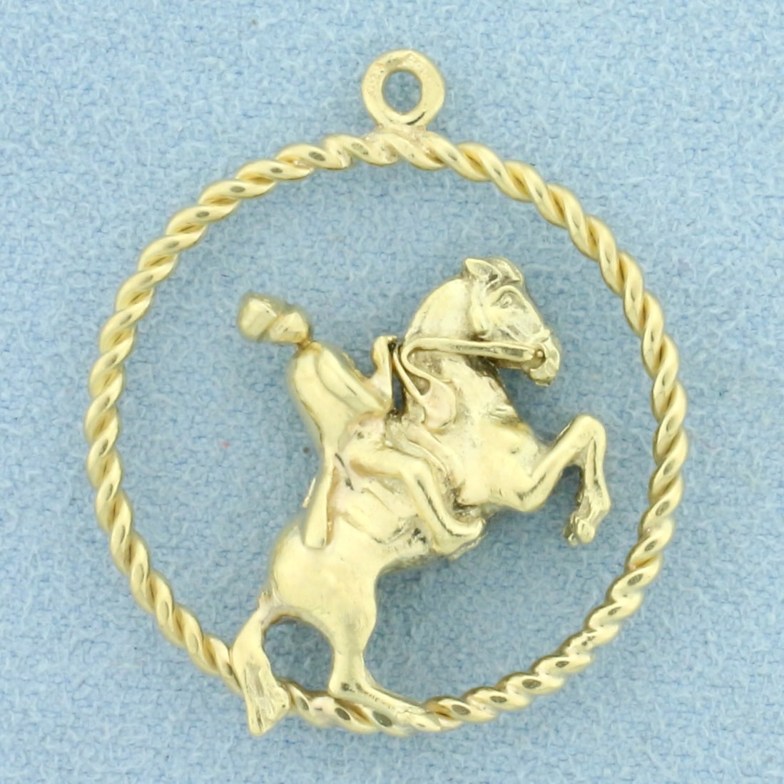 Cavalry Soldier on Horseback Pendant in 14K Yellow Gold: In 14K Yellow Gold. 1 1/8 inch long including bale. 1 inch wide. 7.2g