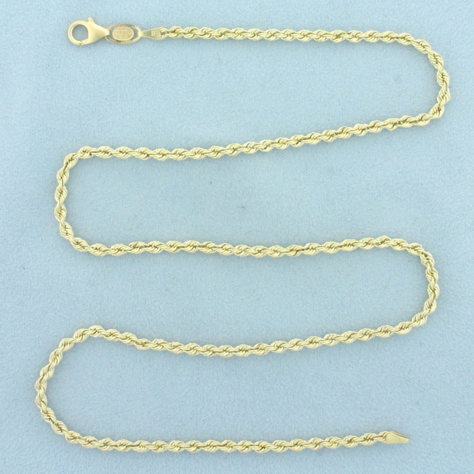 20 Inch Rope Link Chain Necklace in 14k Yellow Gold: In 14k Yellow Gold. 20 inches long. 3mm wide. Lobster clasp. 4.2g.