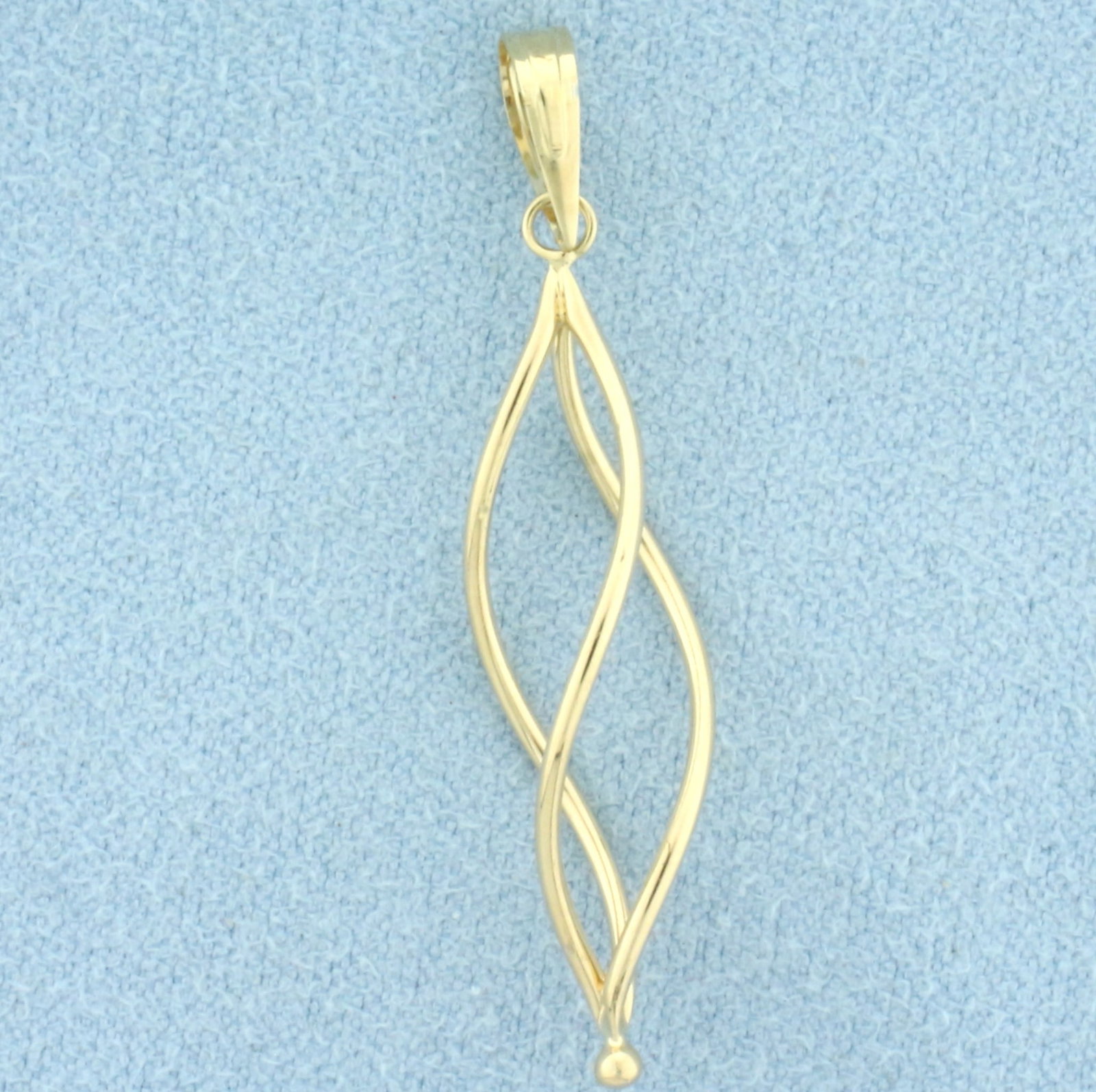 Abstract Spiral Drop Pendant in 14k Yellow Gold: In 14k Yellow Gold. 1 1/2 inch long by 1/4 inch wide. 0.6g.