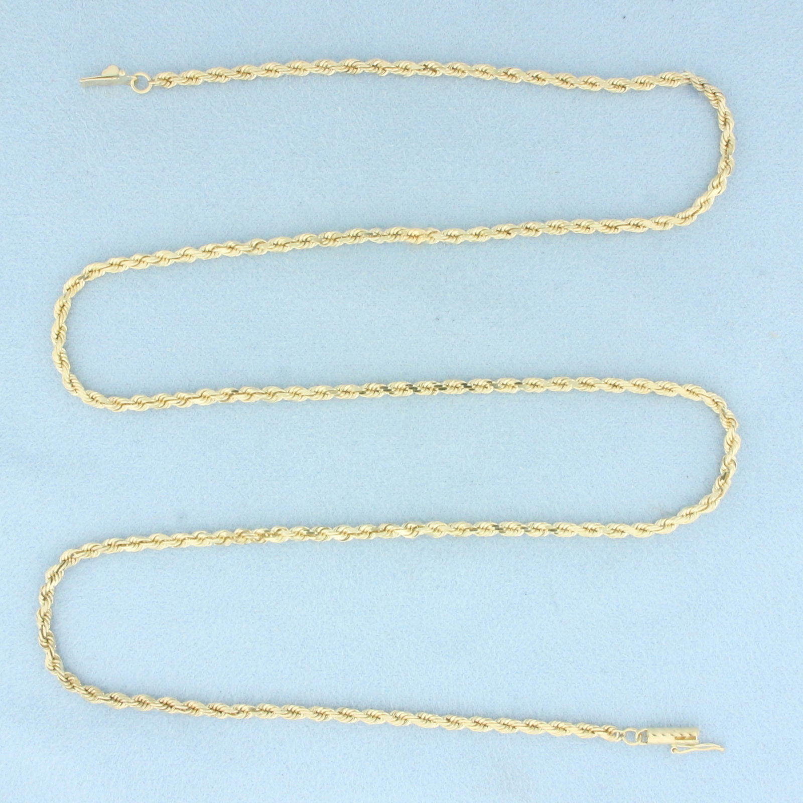 24 Inch Diamond Cut Rope Link Chain Necklace in 14k Yellow Gold: In 14k Yellow Gold. 24 inches long. 2.7mm wide. Barrel clasp with safety latch. 16.3g.