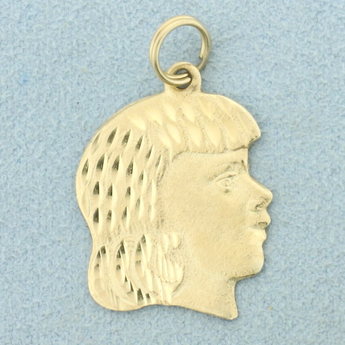 Girl Silhouette Pendant in 14K Yellow Gold: In 14K Yellow Gold. 1 inch long with jump ring. Can inscribe name or date on back. 2.4g.