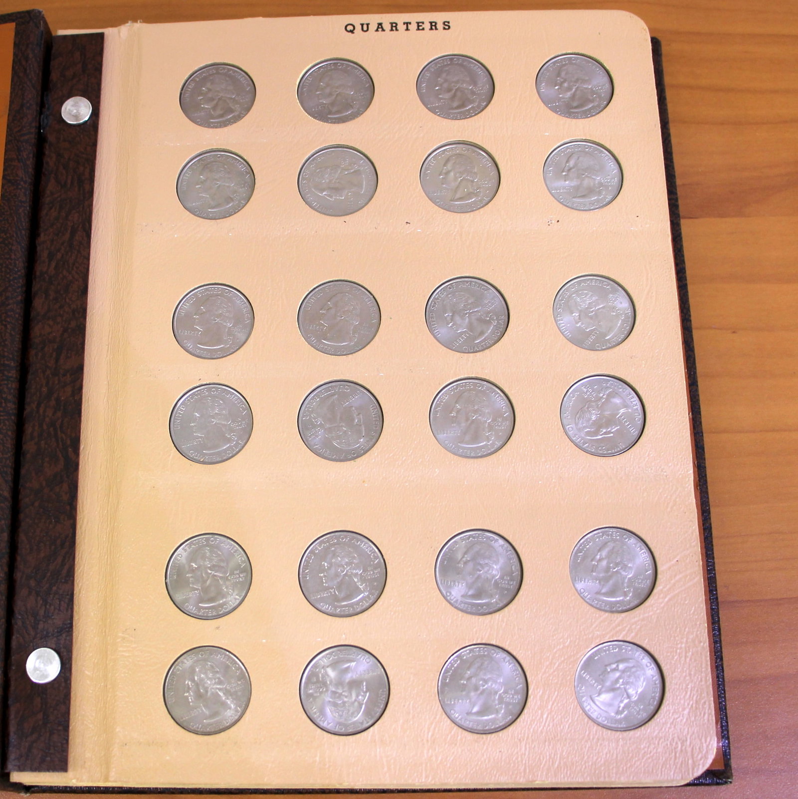 Washington Silver Quarter Coin Album 1941-2002: Contains 40 .900 Silver Washington Head Quarters, 76 Clad Quarters. Comes with album.