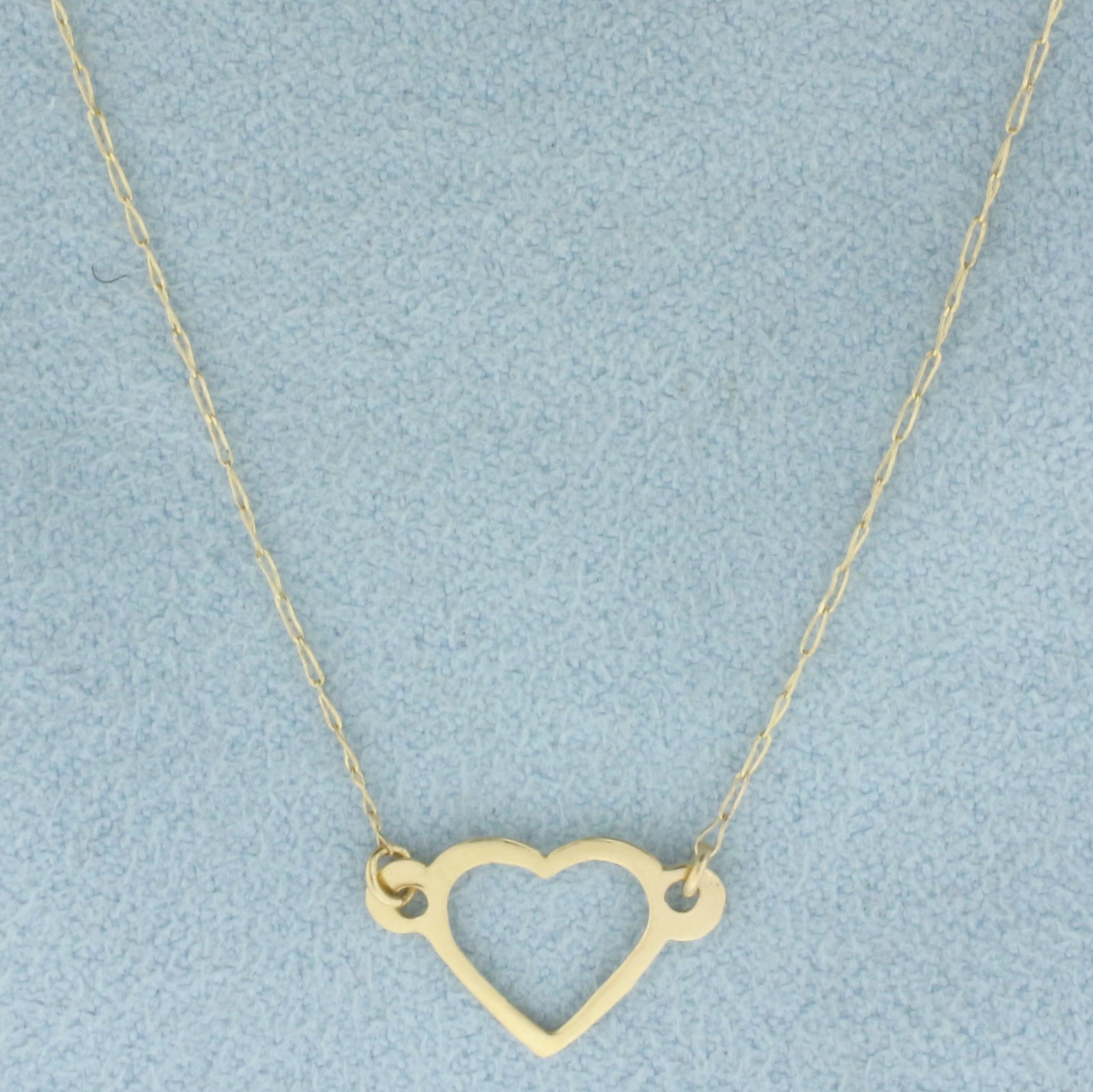 Heart Necklace in 14k Yellow Gold: In 14k Yellow Gold. 14mmx10mm heart. 18 inches long. Spring clasp. .7g.
