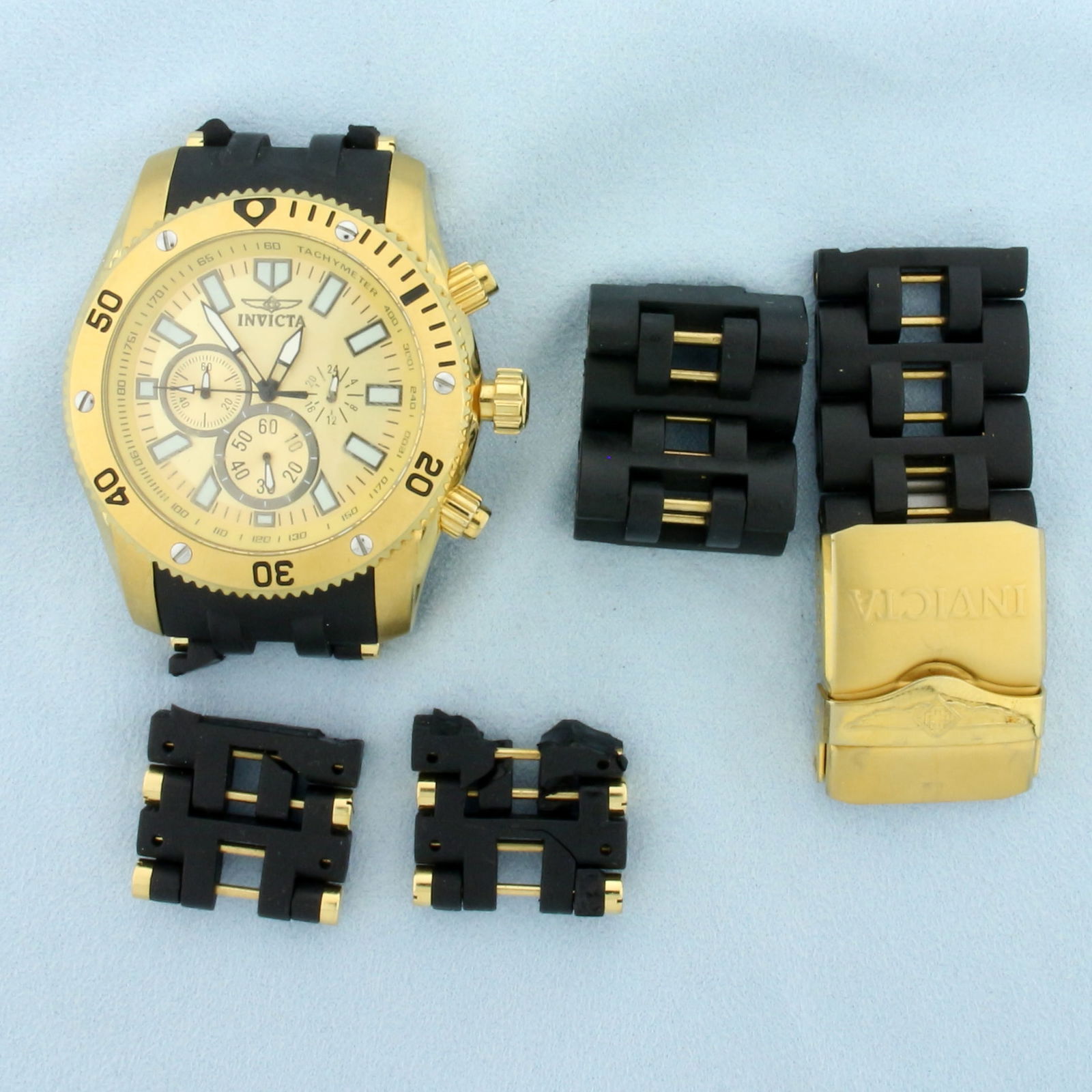 Mens Invicta Sea Spider 14813 Watch: In Gold Plated Stainless Steel Case. Stainless Steel and Polyurethane band. Quartz movement. New battery, runs great. Never been worn. Band broken as seen in picture.