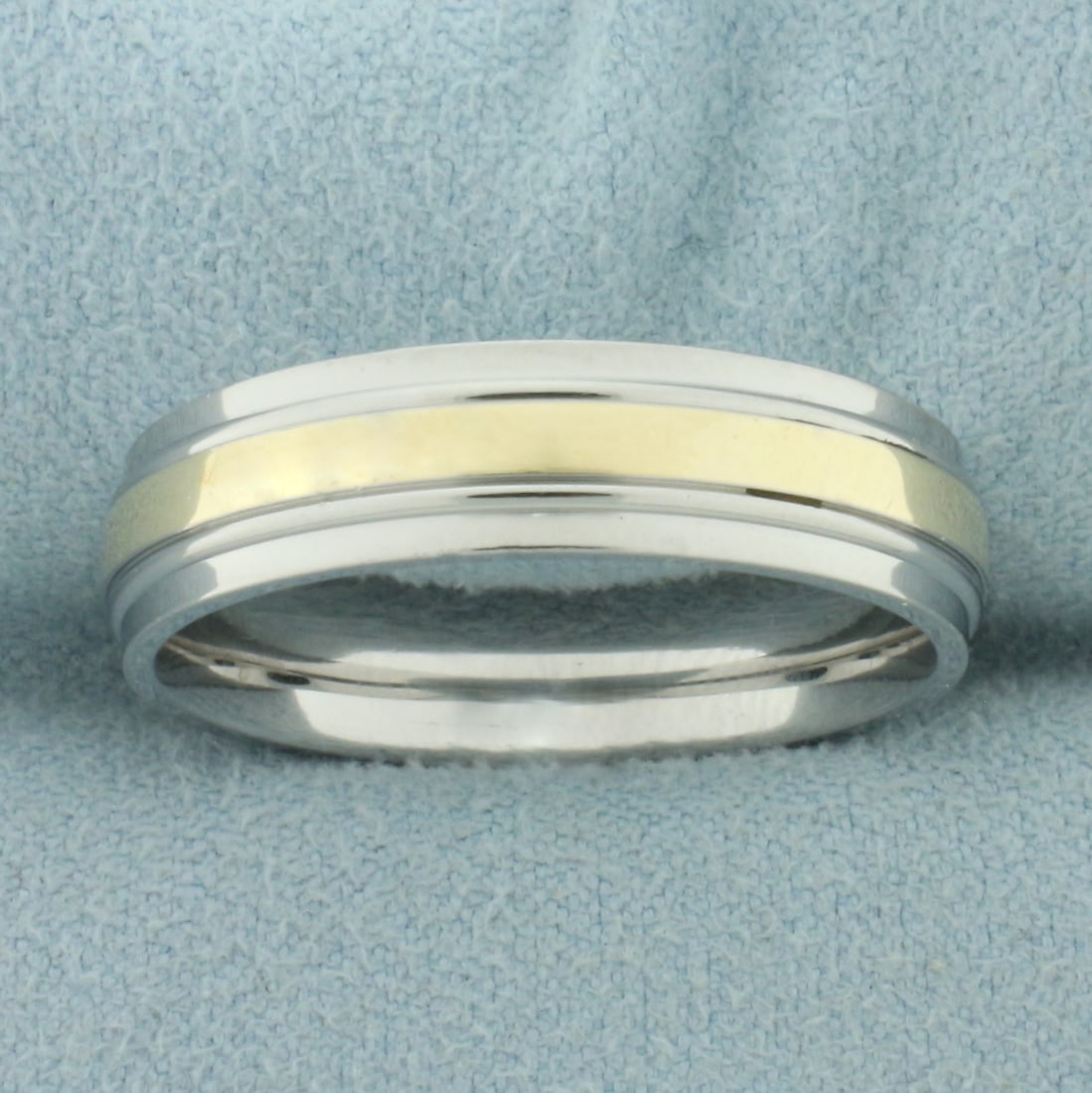 Mens Stainless Steel and Gold Wedding Band Ring In 10k Yellow Gold and Stainless Steel: In 10k yellow gold and stainless steel. 6mm wide. Size: 11.25. 5.9g.